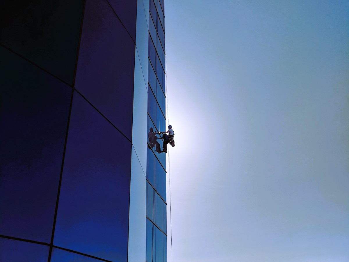 Man on a high-rise building